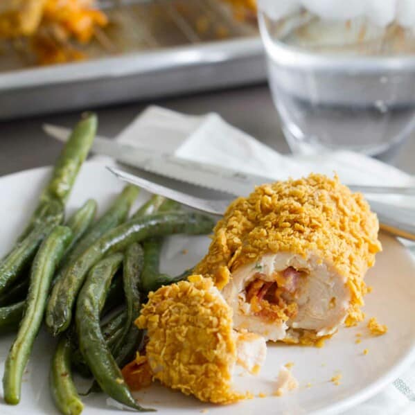Cheddar and Bacon Stuffed Chicken on a dinner plate