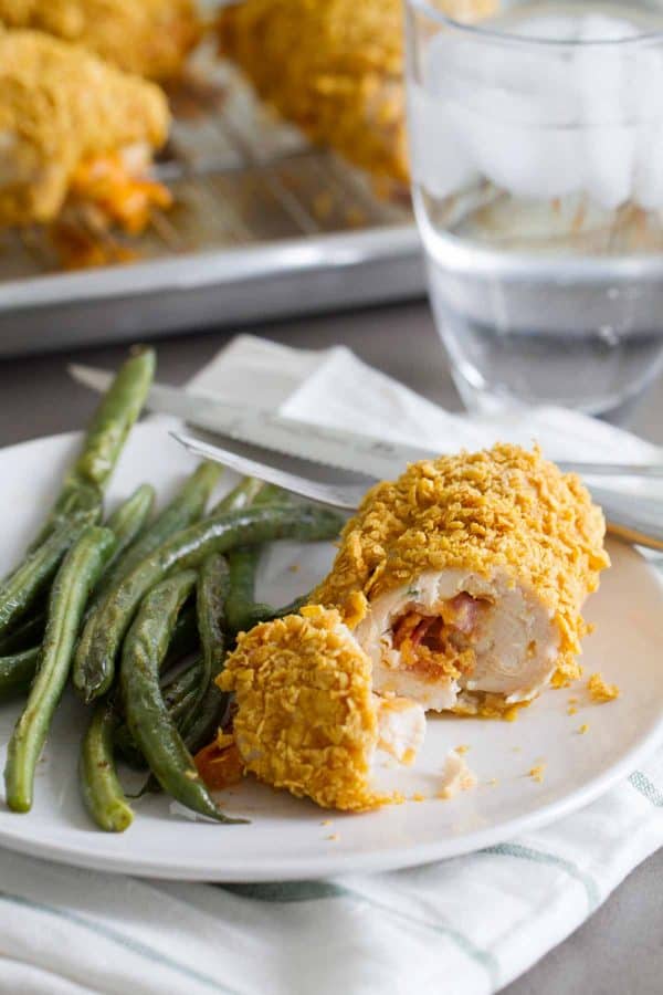 Cheddar and Bacon Stuffed Chicken on a dinner plate