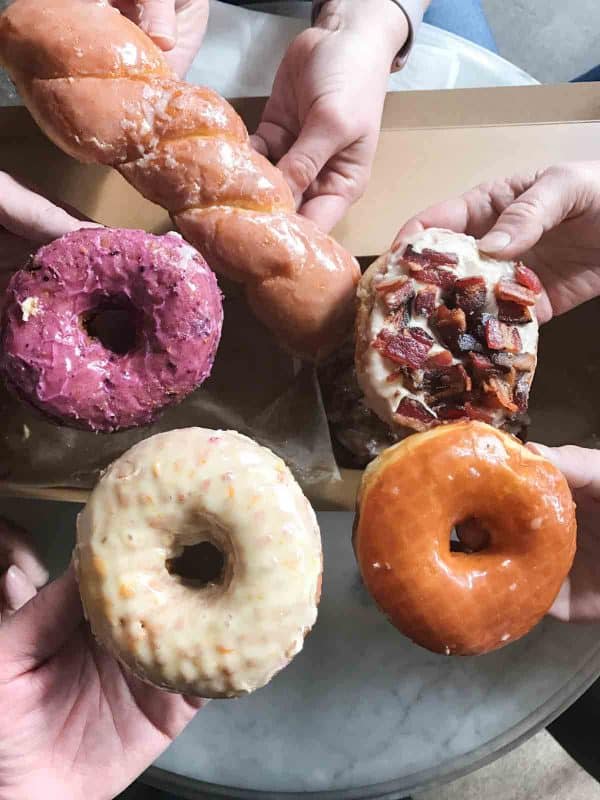 a variety of doughnuts from Sidecar Doughnuts