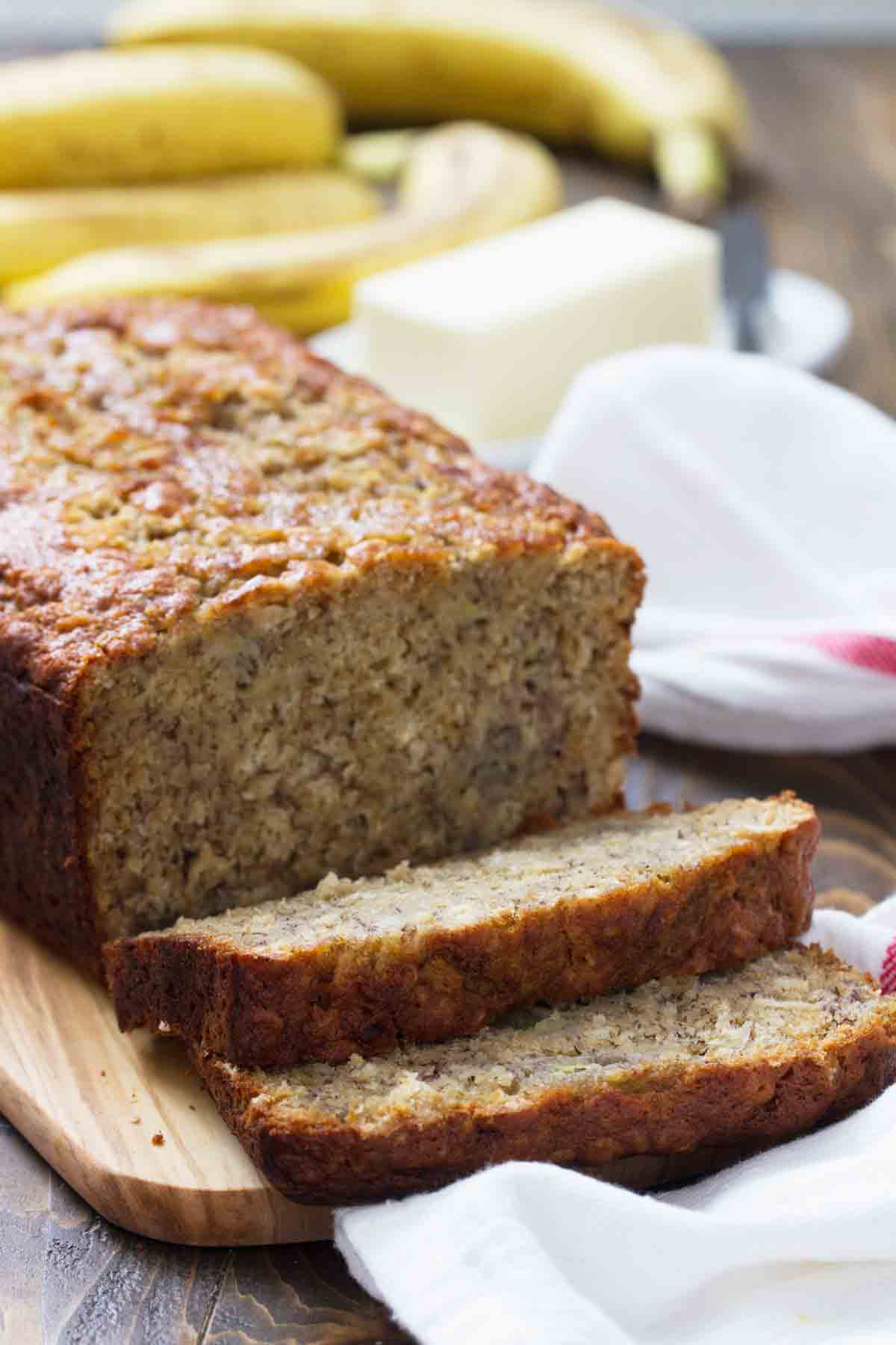 Sliced Banana Oat Bread on a cutting board.