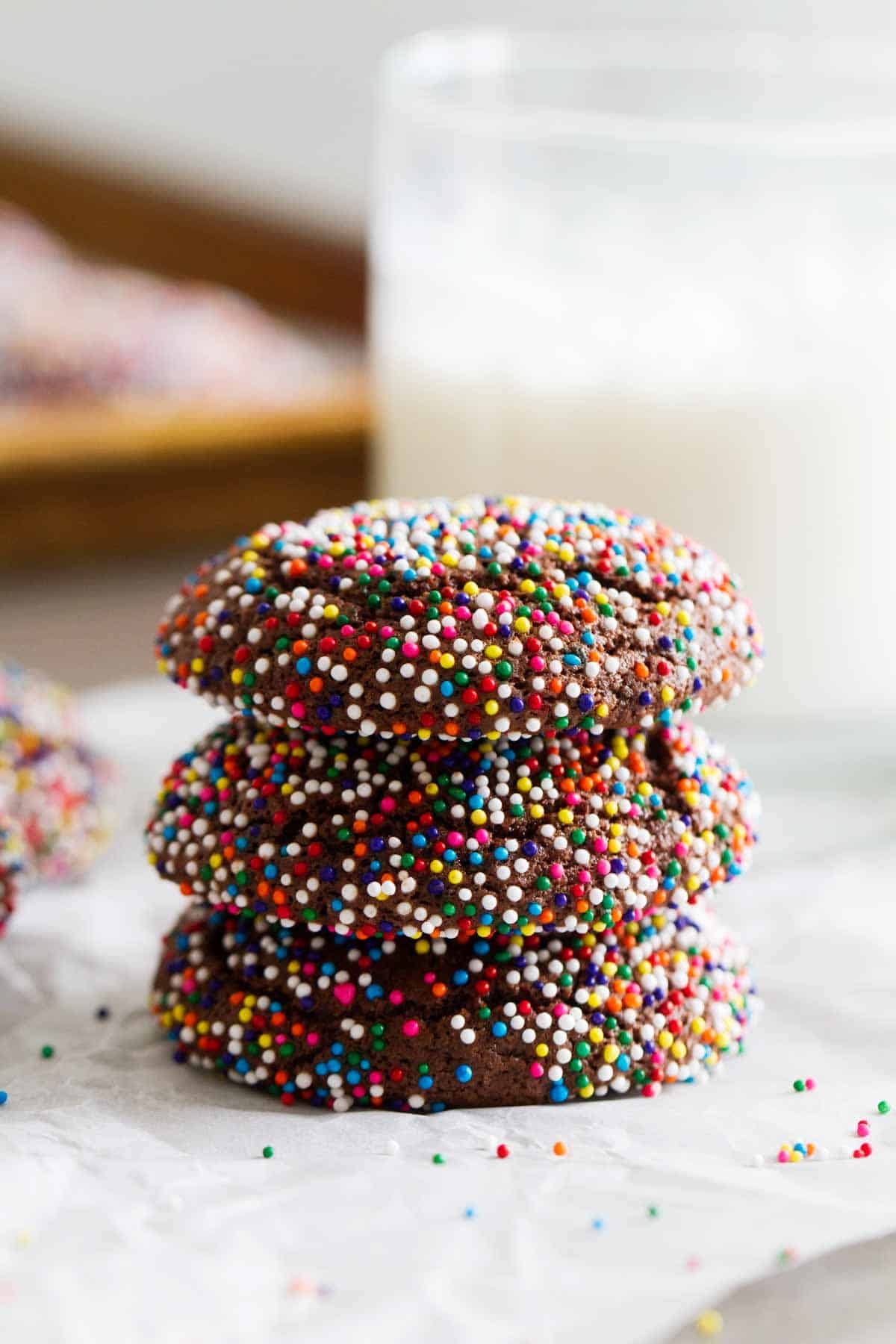stack of chocolate crinkle sprinkle cookies