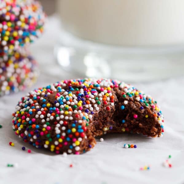 Chocolate Crinkle Sprinkle Cookie with a bite taken from it