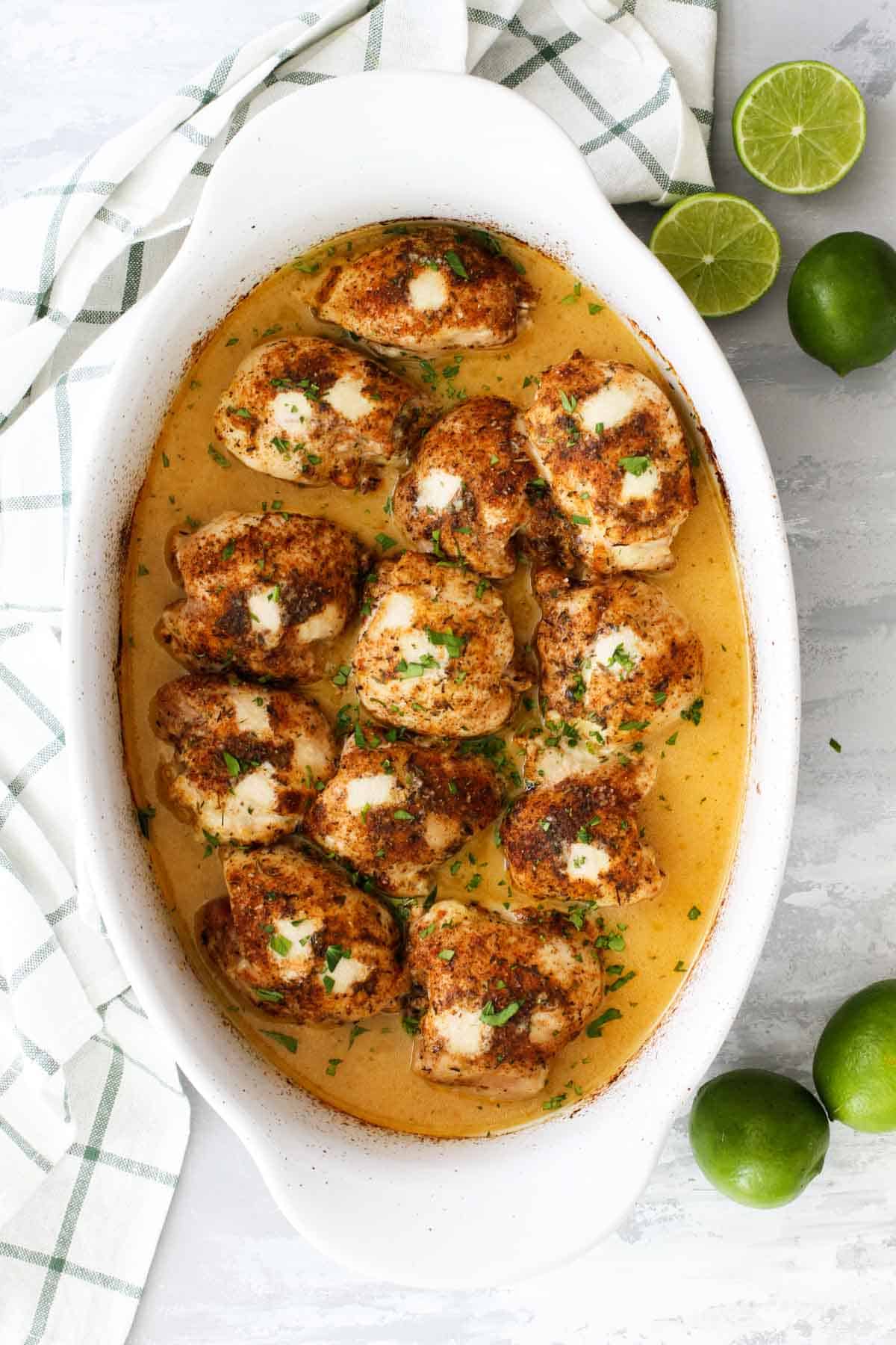 Lime Baked Chicken Thighs in a baking dish.