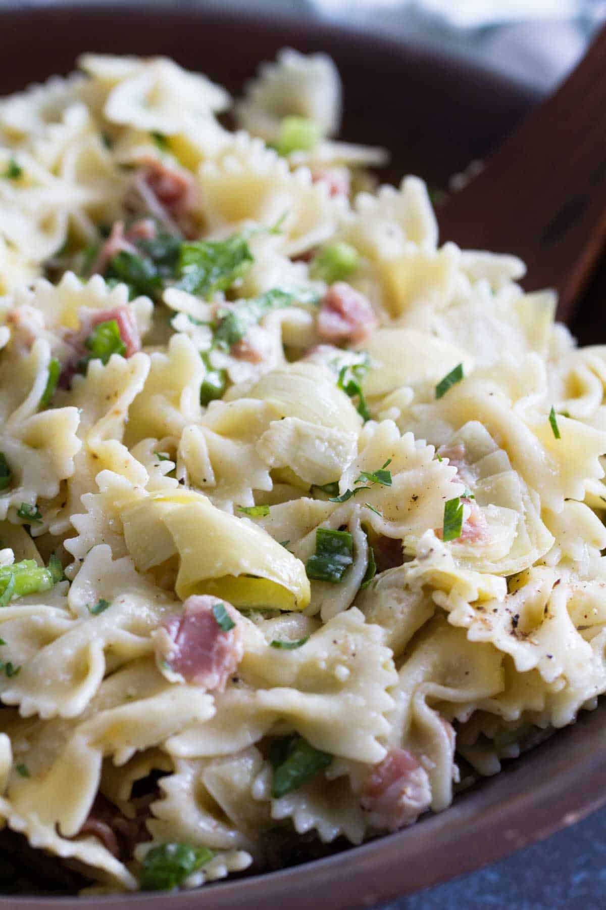 pasta salad with artichokes, prosciutto, adn herbs