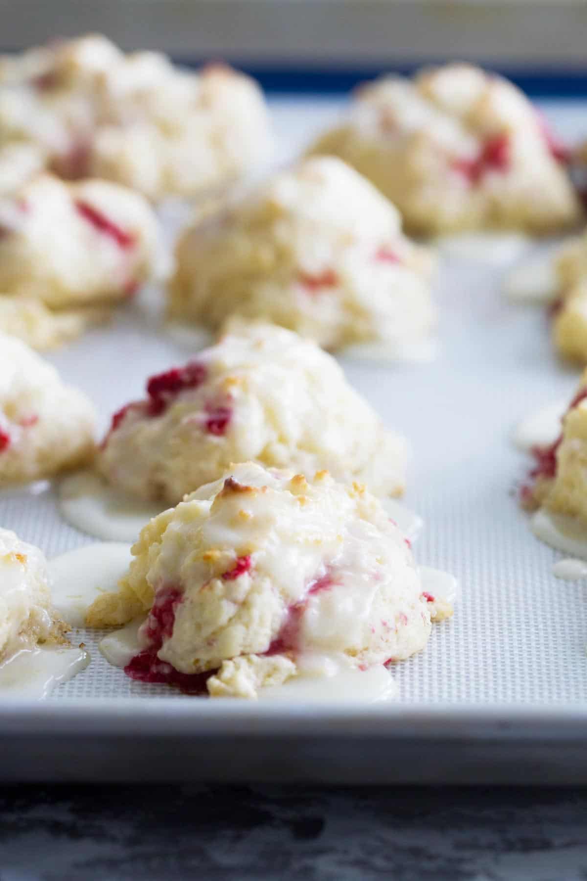 Raspberry Lemon Breakfast Biscuits with lemon glaze.