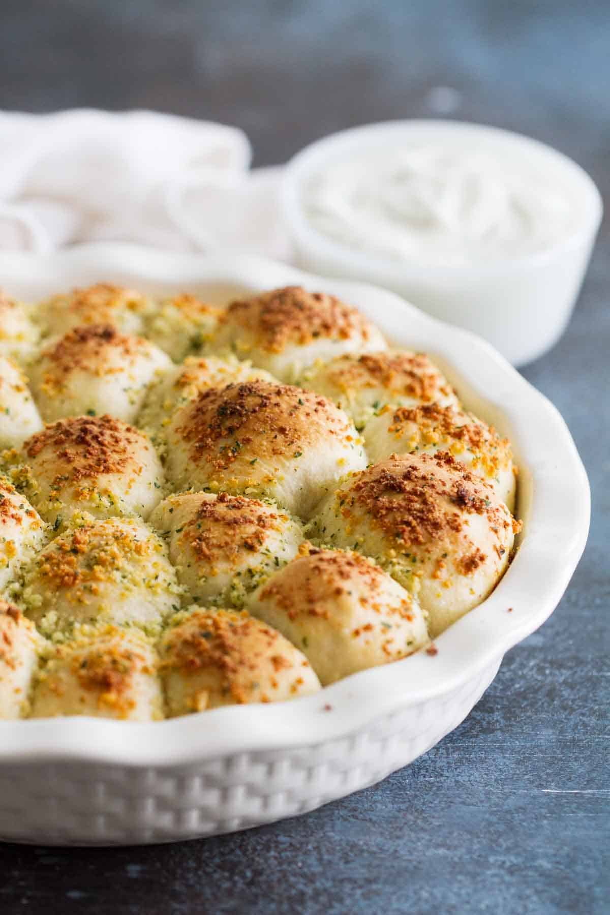 Stuffed Pizza Rolls in a round baking dish.