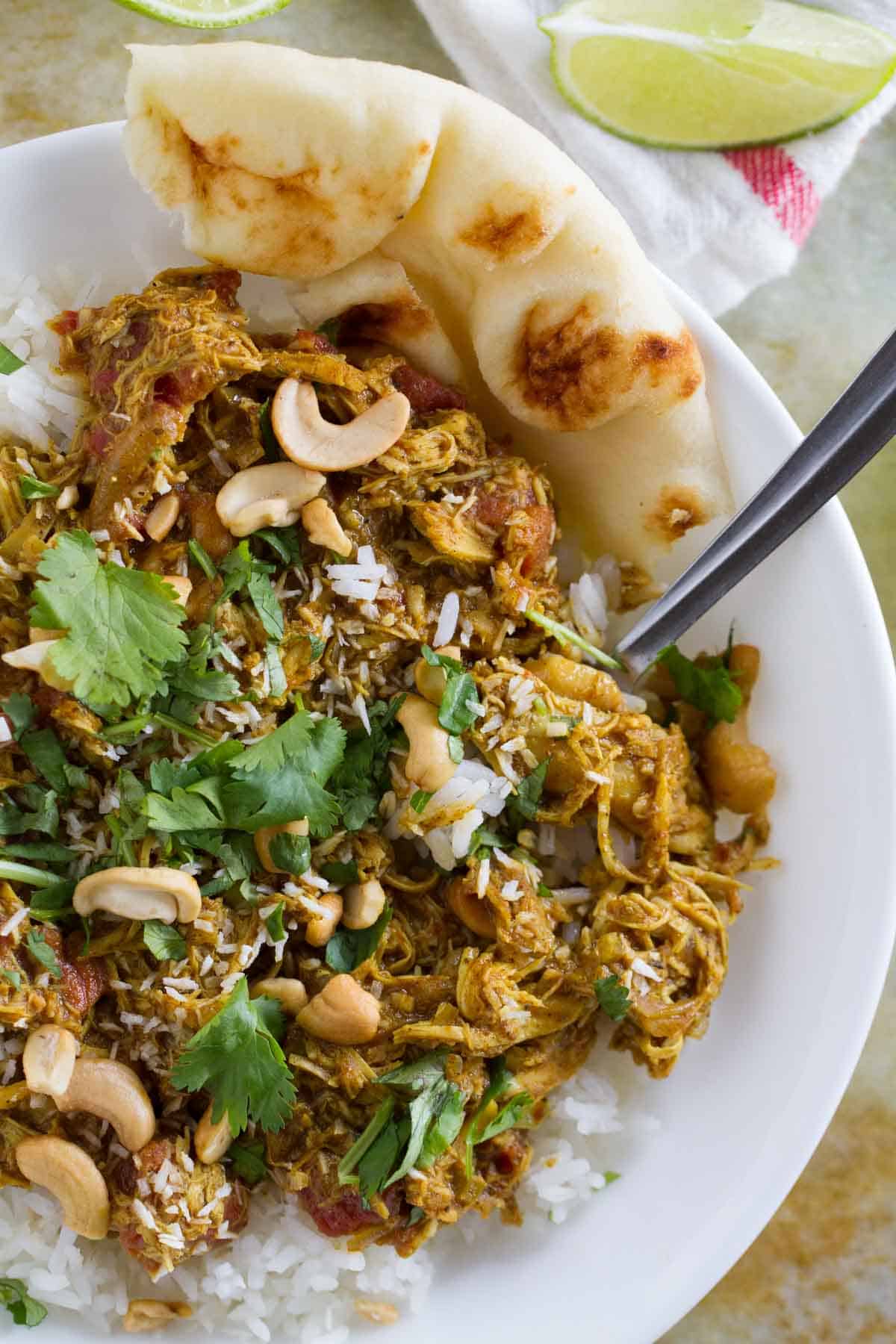 Easy Coconut Curry Chicken topped with cilantro.