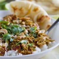 Bowl of Coconut Curry Chicken over rice.