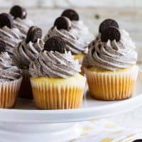 Cookies and Cream Cupcakes on a baking stand.