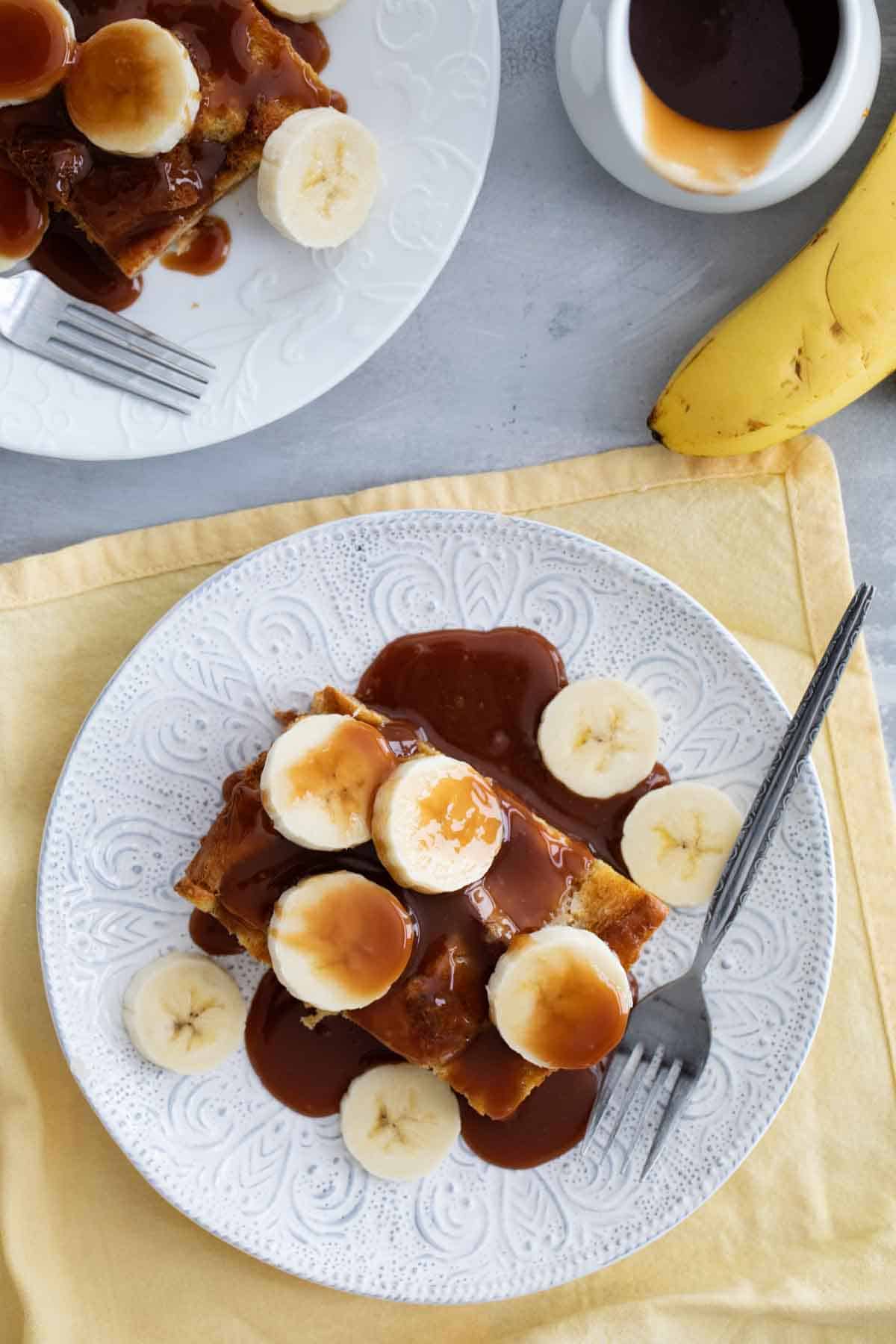 Brioche French Toast with Salted topped with salted Caramel and fresh Bananas.