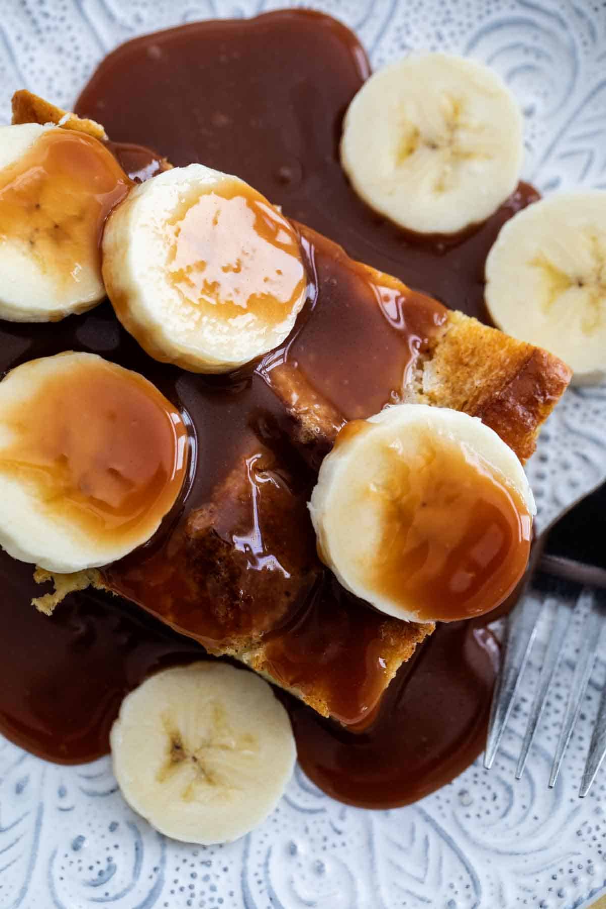 close up of Brioche French Toast with Salted Caramel and Bananas.