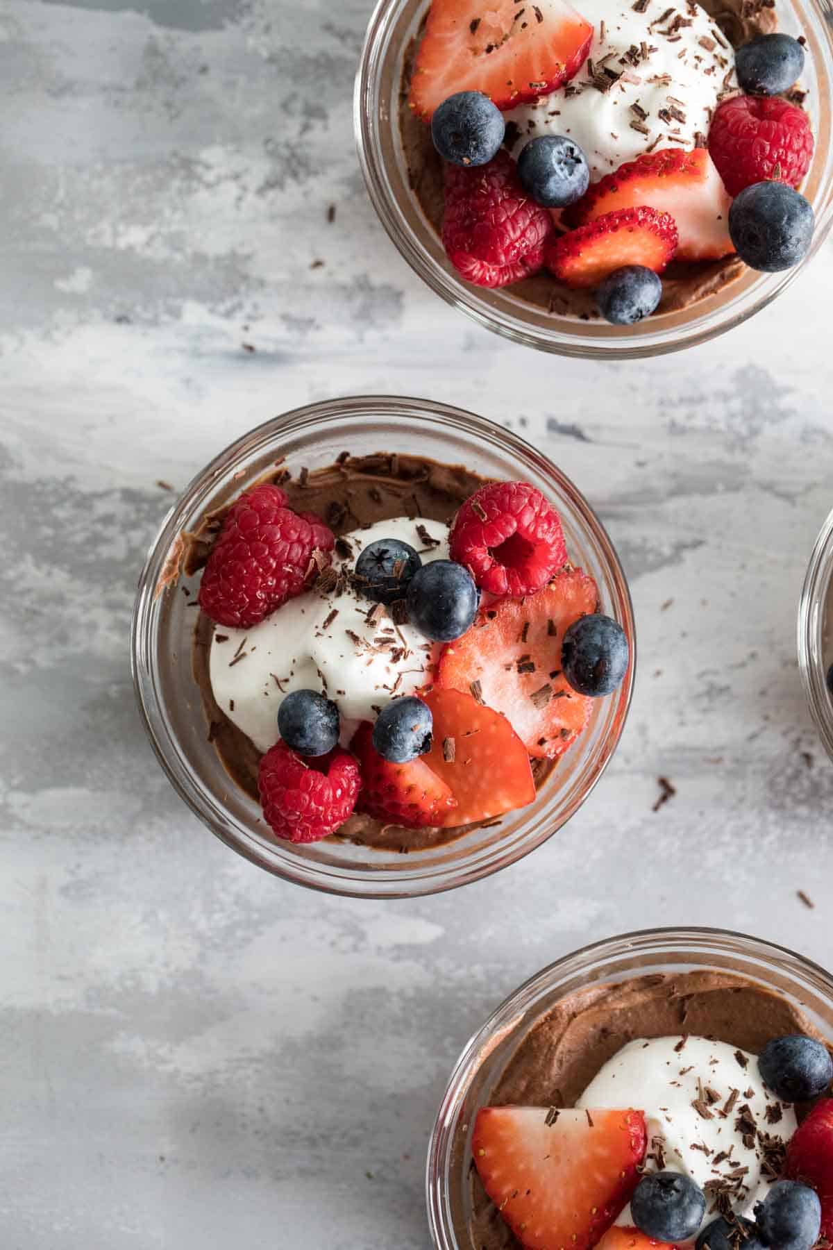 Bowls of Chocolate Mousse with Berries.