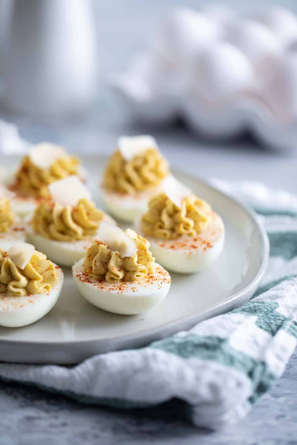 https://www.tasteandtellblog.com/wp-content/uploads/2019/03/Caesar-Deviled-Eggs-Recipe-tasteandtellblog.com-1.jpg