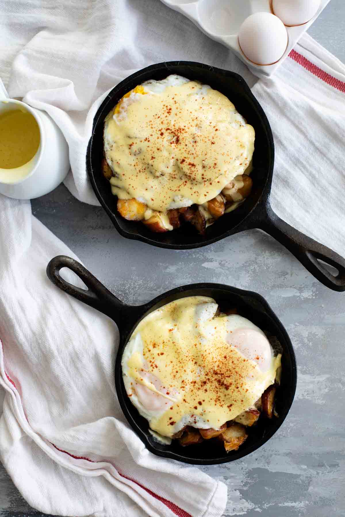 Meat and Potatoes Breakfast Skillet in 2 cast iron skillets.