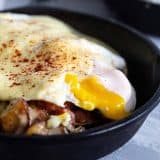 Sunny Side Egg on a Meat and Potatoes Breakfast Skillet