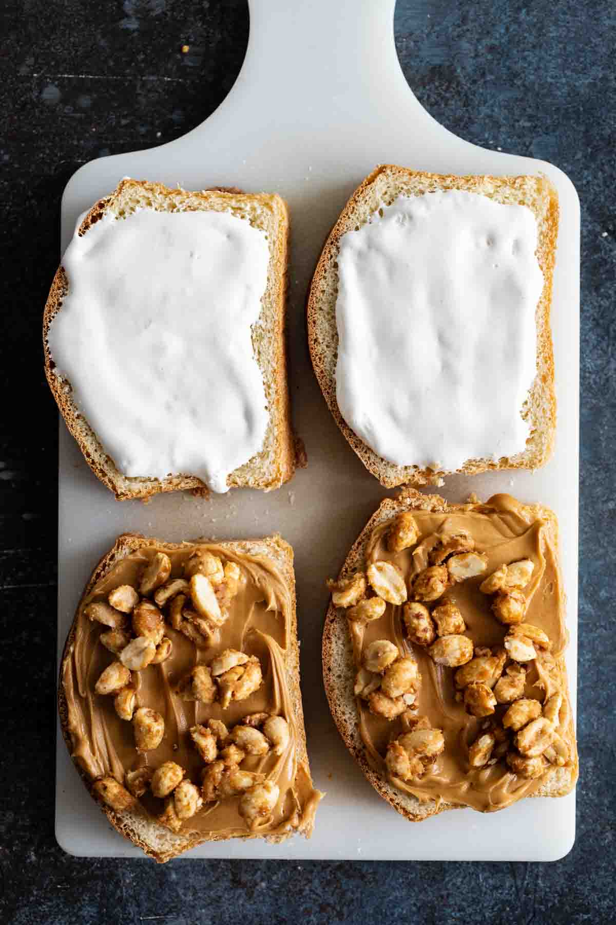 Assembling a fluffernutter sandwich.