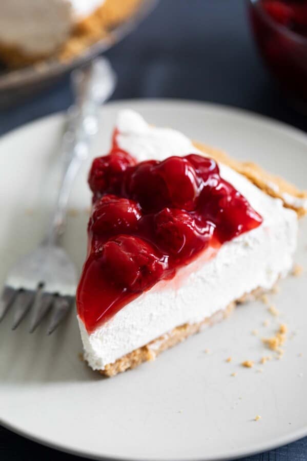 Slice of No Bake Cheesecake with Cherry Topping