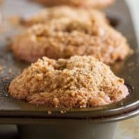 Apple cinnamon muffins in a muffin tin