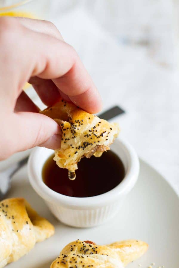 Dipping Breakfast Pigs in a Blanket in Syrup