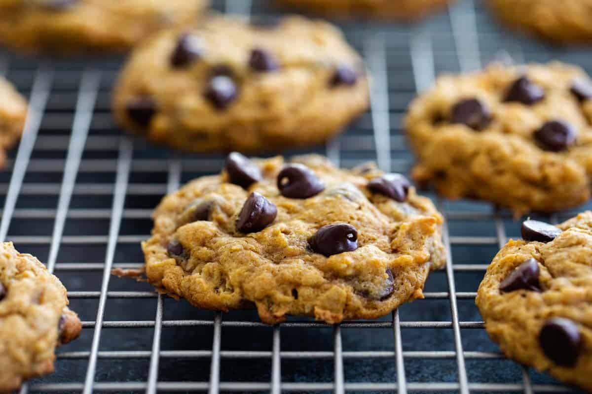 Oatmeal Pumpkin Chocolate Chip Cookies on a cooling rack