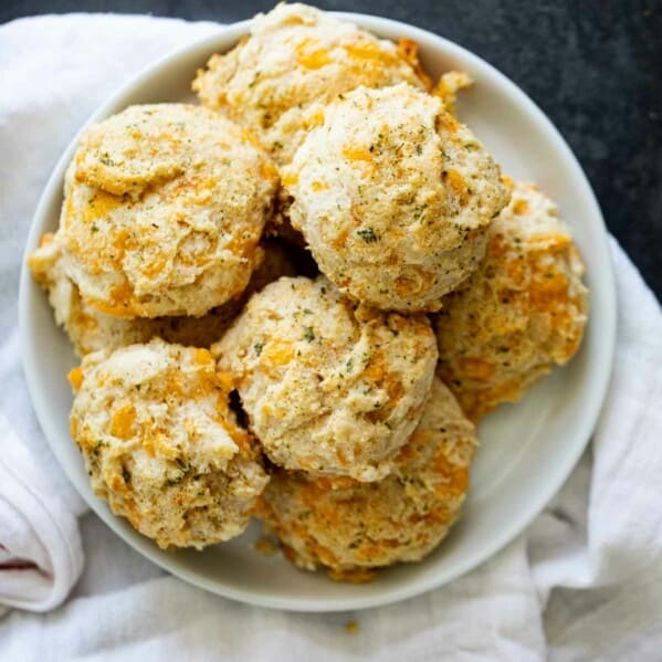 Copycat Red Lobster Biscuits stacked in a bowl.