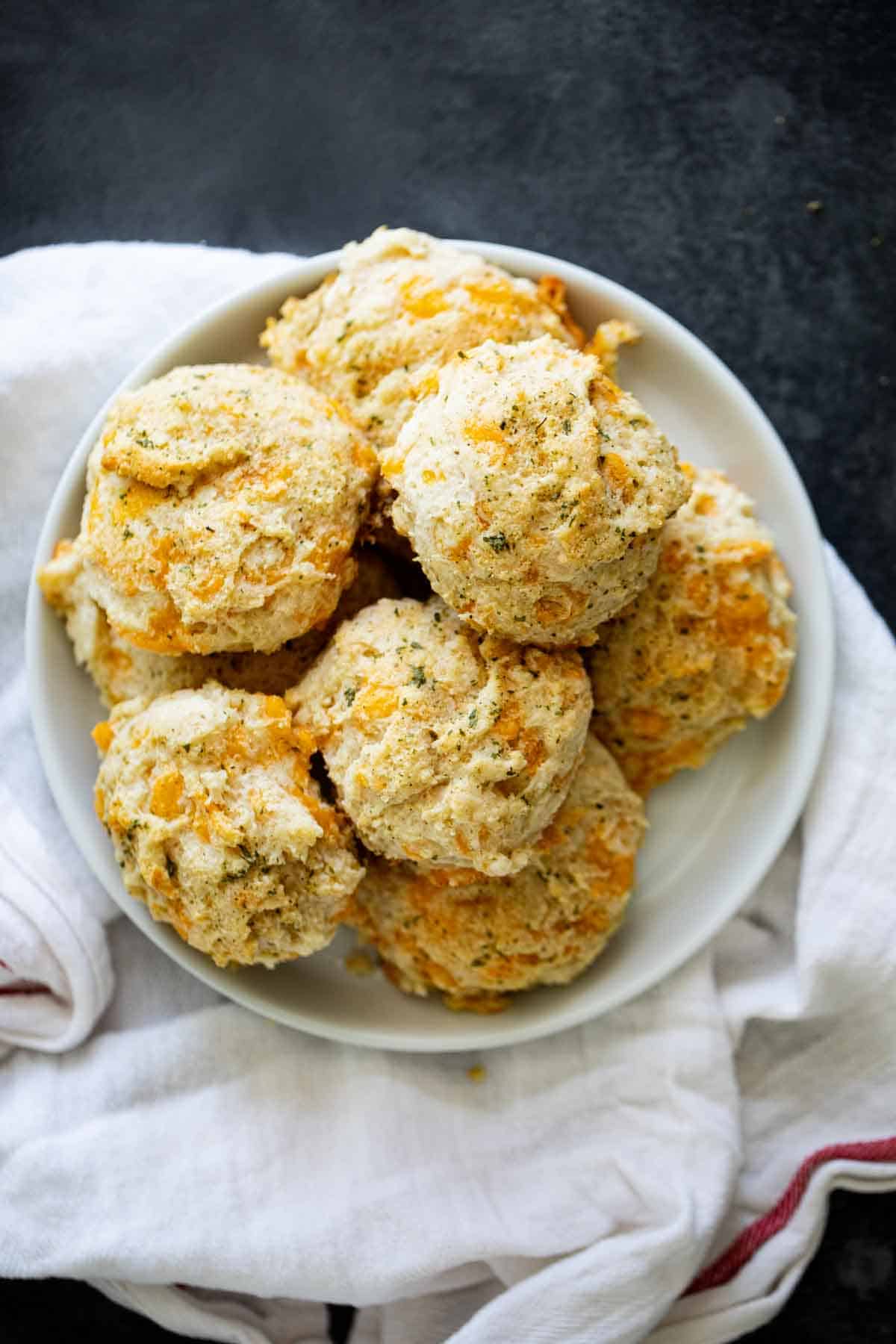 Copycat Red Lobster Biscuits stacked in a bowl.