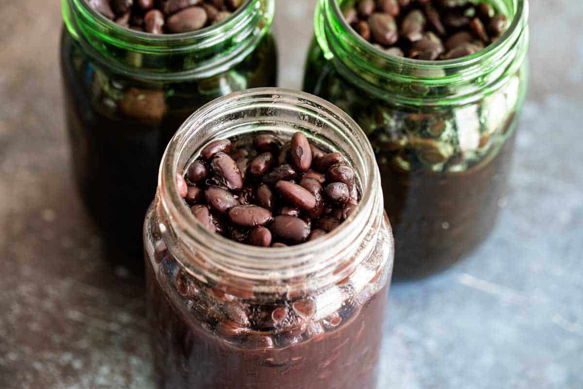 Soft Slow Cooker Black Beans in jars.