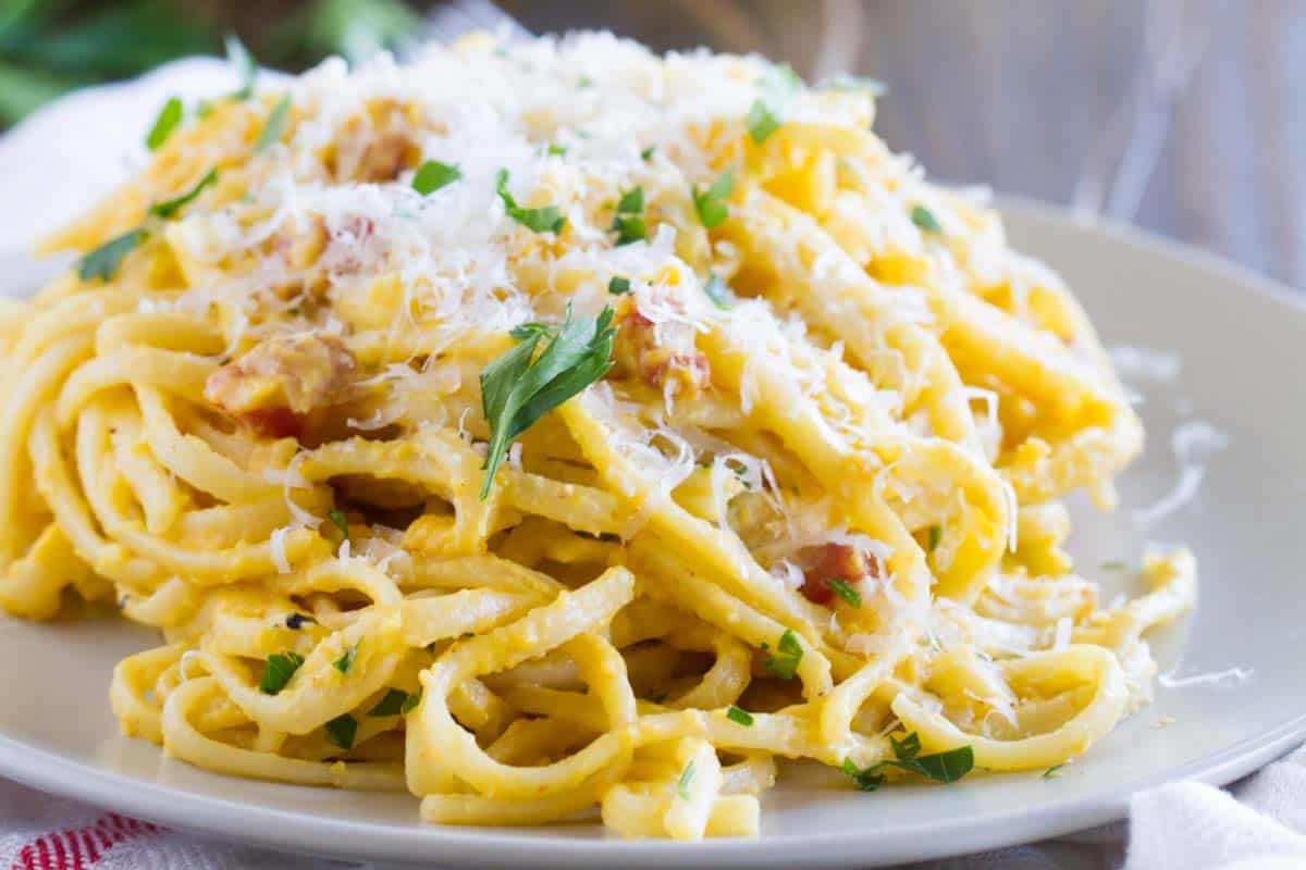 Roasted, pureed butternut squash is the base of this Creamy Butternut Squash Pasta - the perfect, comforting fall dinner. butternut squash pasta with parmesan chese