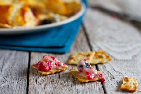 Brie and fruit on crackers