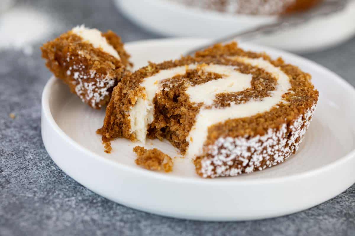 Texture of Pumpkin Roll showing cream cheese filling