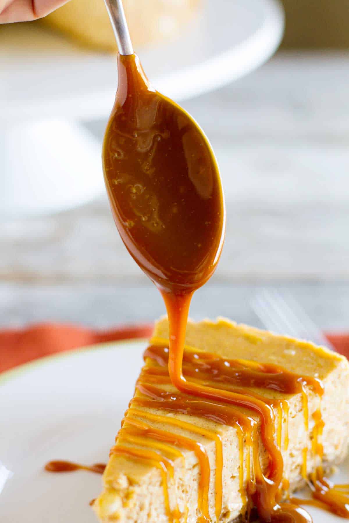 homemade caramel sauce on cheesecake