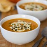 pumpkin soup with sour cream and pepitas