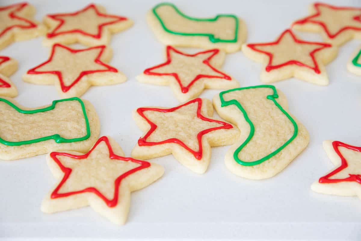 frosting sugar cookies with sugar cookie icing