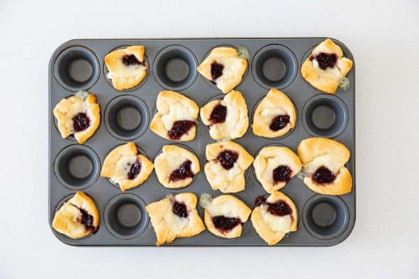 You only need three ingredients for these super easy Crescent Raspberry Brie Bites. The perfect party appetizer, you’ll have these on the table in no time at all. Baked Brie Bites