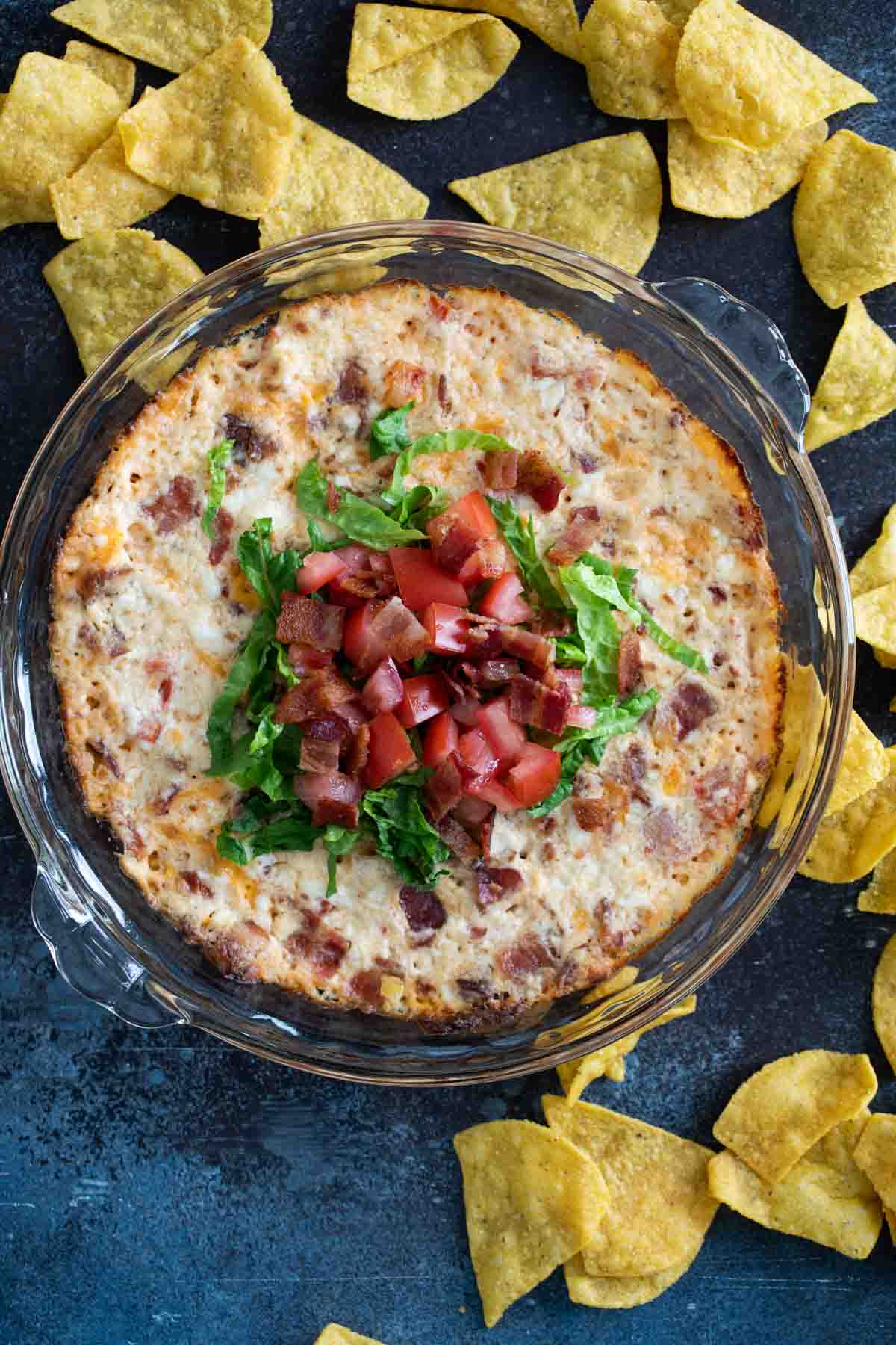 BLT Dip topped with lettuce and tomatoes