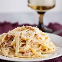 plate of bacon and brie fettuccine