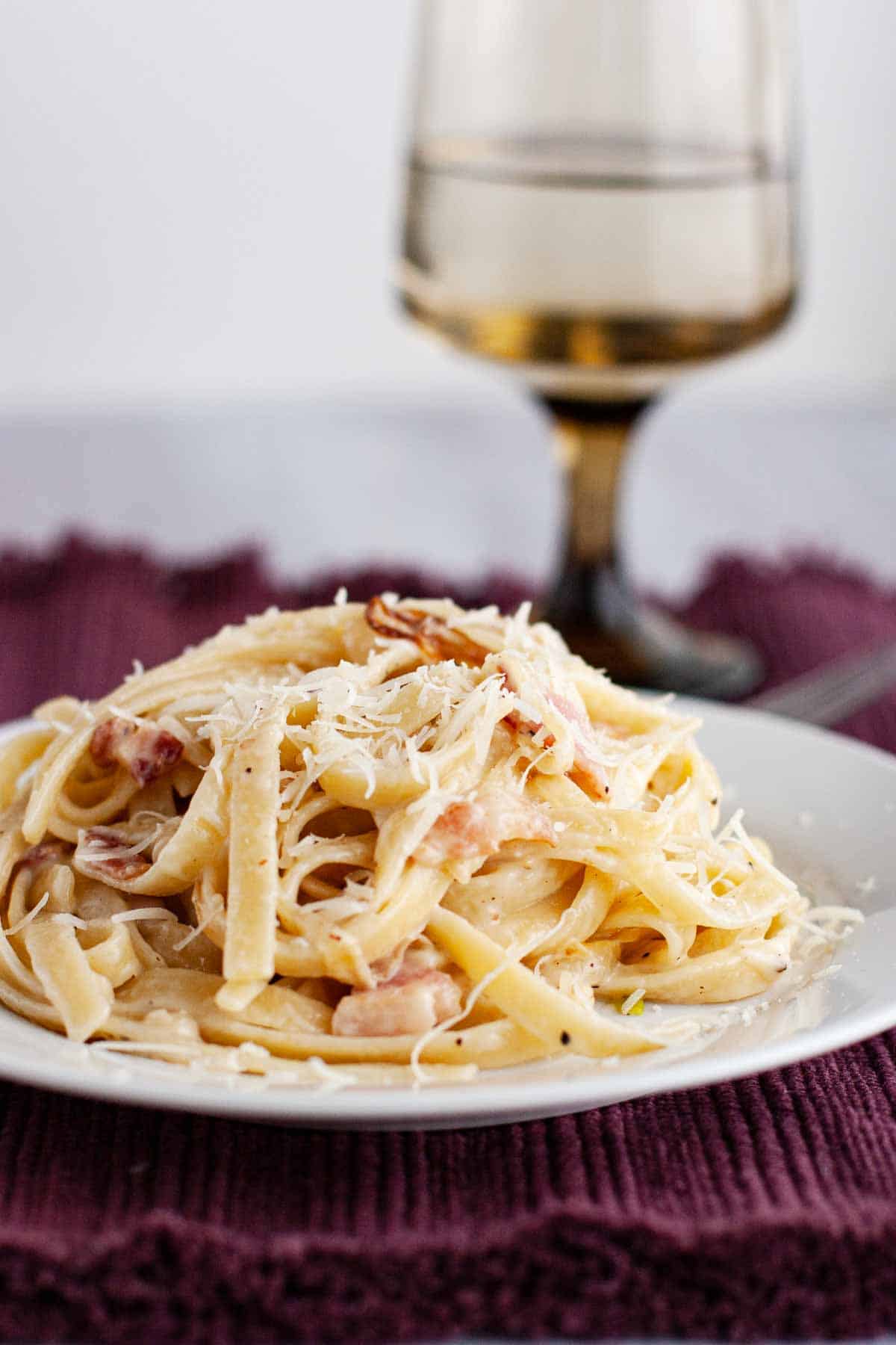 plate of bacon and brie fettuccine