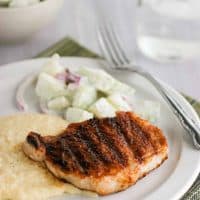 Barbecue pork chops over cheddar grits