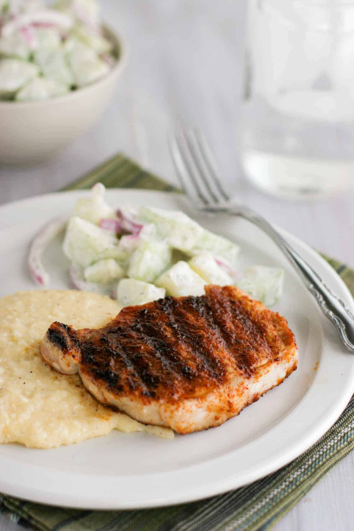 Barbecue pork chops over cheddar grits