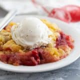 Serving of Cherry Dump Cake with Ice Cream