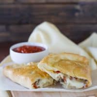 Italian Calzones Recipe filled with ricotta, cheese, pepperoni and sausage