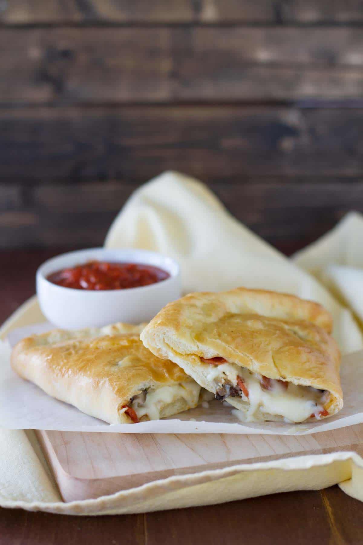 Italian Calzones Recipe filled with ricotta, cheese, pepperoni and sausage