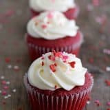 Red Velvet Cupcakes topped with frosting and sprinkles