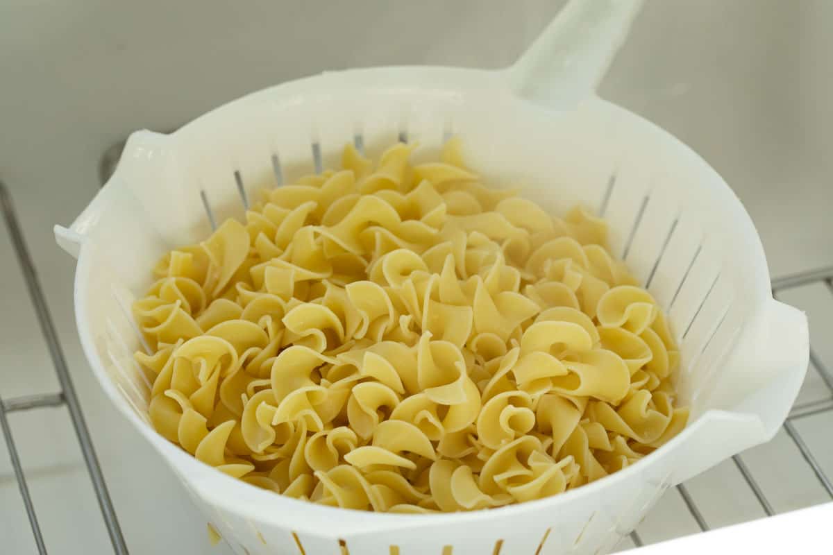 A childhood classic that should be in every recipe repertoire, this Tuna Casserole is nostalgic and comforting and creamy and delicious. It’s always a family favorite for a reason! Egg Noodles in a Colander