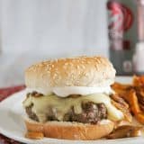 Worcestershire Burgers on a plate with sweet potato fries