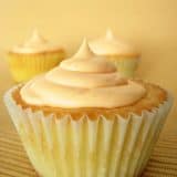 Vanilla Cupcake Topped with Orange Cream Cheese Frosting