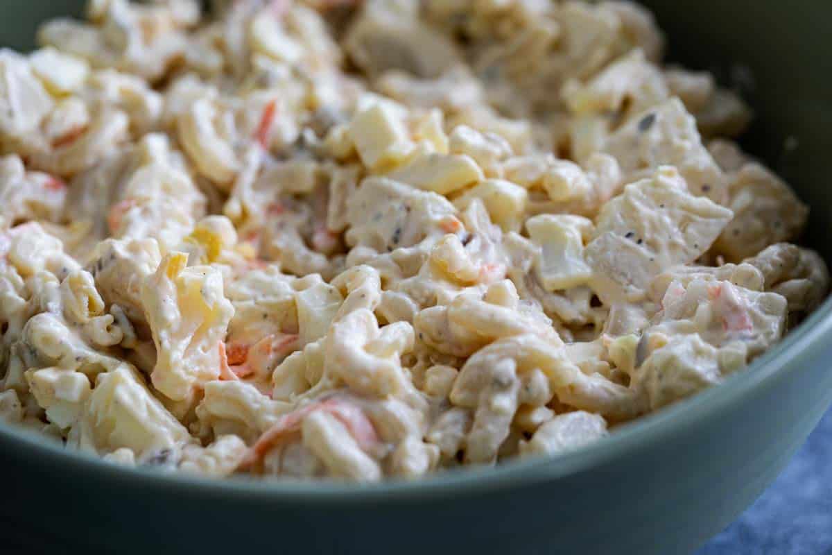The perfect Hawaiian side dish, this Hawaiian Macaroni Salad is a creamy combination of pasta salad and potato salad. Creamy Macaroni Salad with Potatoes