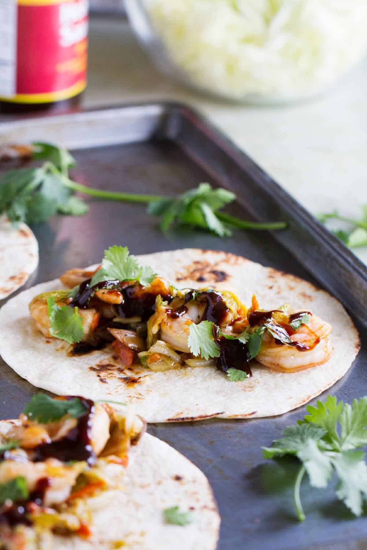 hoisin sauce on moo shu tacos