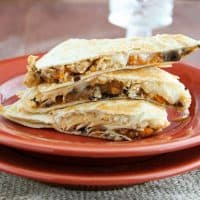 Sweet Potato Chicken Quesadillas Stacked on a Plate