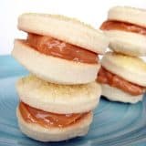 Alfajores de Dulce de Leche stacked on a plate